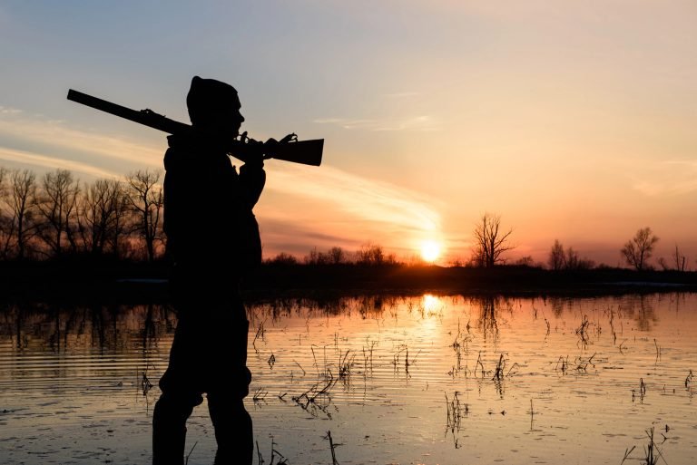 How do game conservation laws affect hunters?